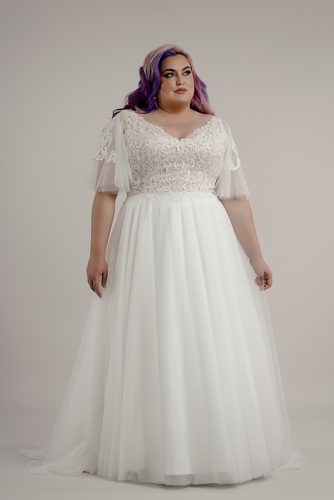 Plus size wedding dress with tulle sleeve