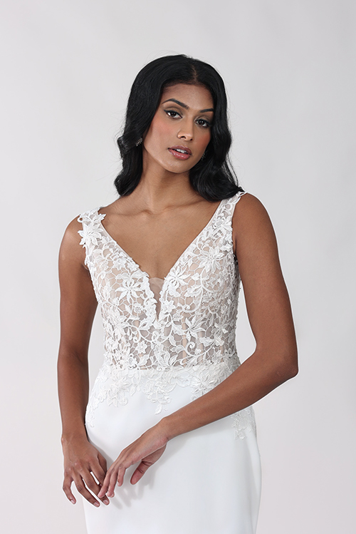 lace-detailed bodice fit and flare bridal gown with lovely strap accents.