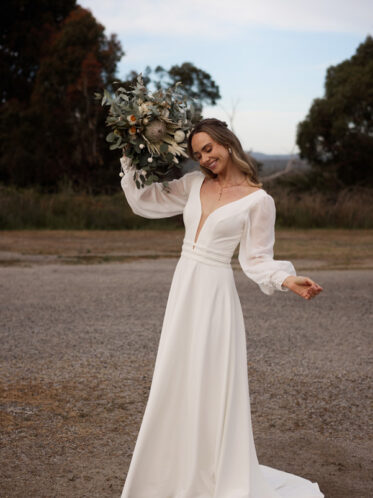 Crepe wedding gown with sleeves in Ivory