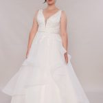 Phoebe plus size wedding dress with waterfall skirt.