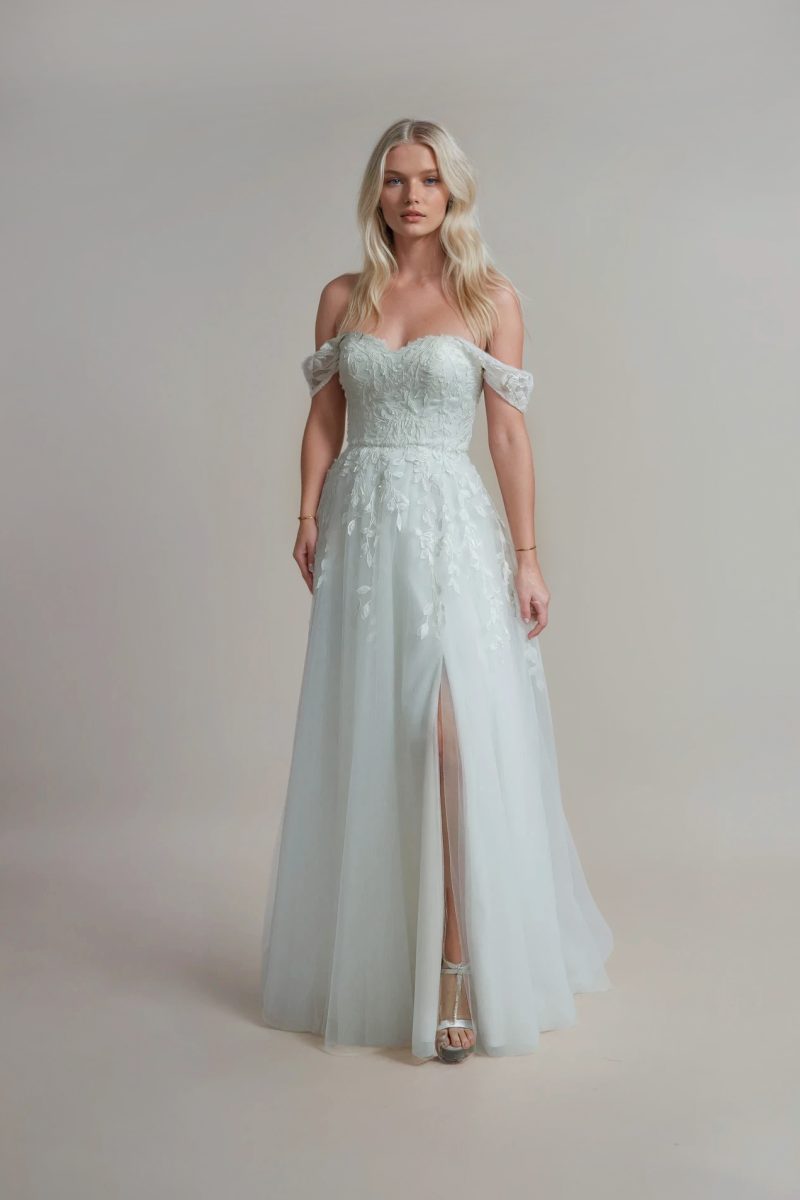 Willow whimsical wedding dress with split.