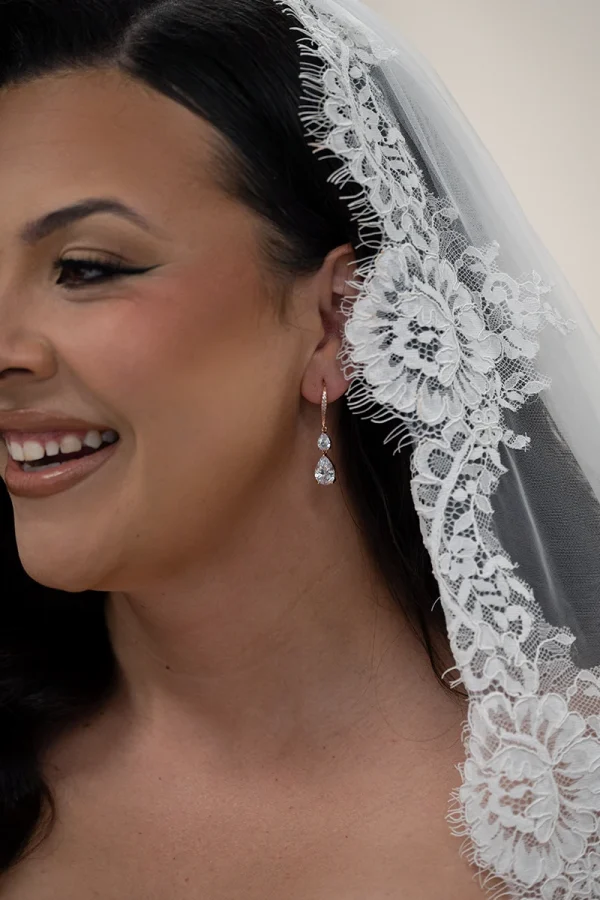 Drop Earrings worn by bride with lace trim veil