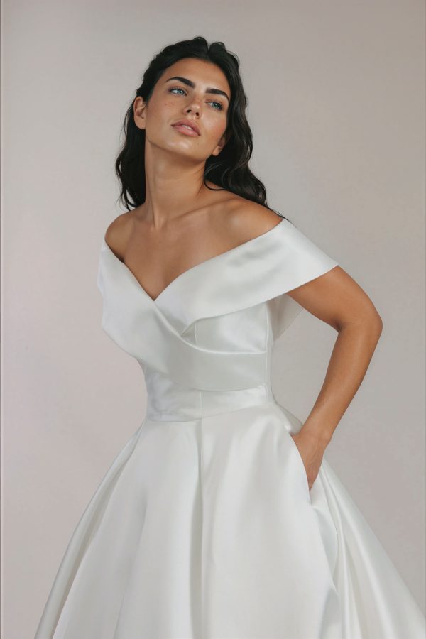 Romy mikado satin wedding dress with off shoulder straps.