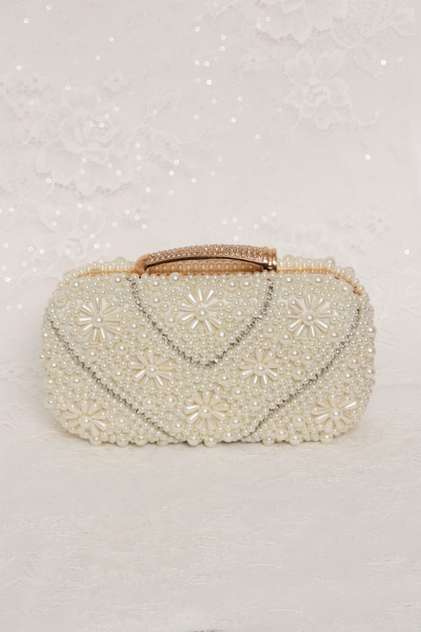 Rose Gold Clutch for bride at wedding.