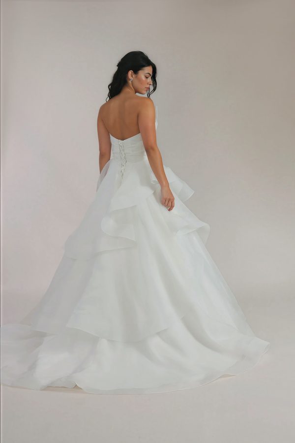 Train Of Addie Dress with ruffled skirt.