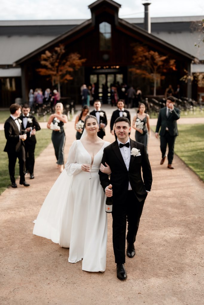 Paige and Anthony's wedding wearing Leah S Designs bridal.