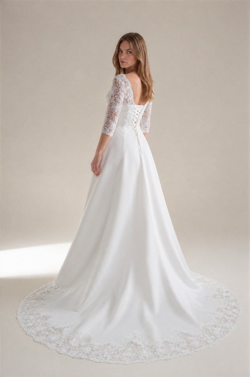 Priya wedding dress with statement lace train