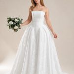 Ivory lace wedding dress with full skirt and train