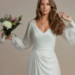 Close-up of Valentina ruched bodice and sheer bishop sleeves