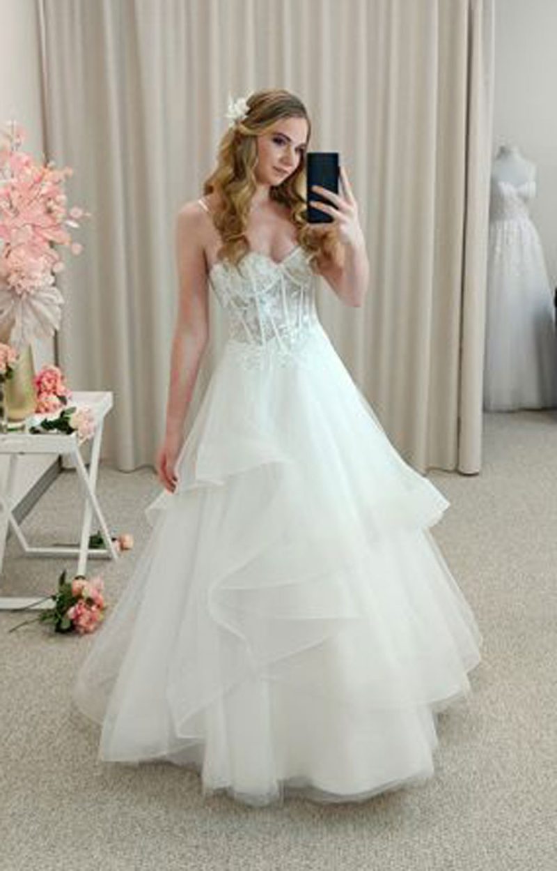 Cascading waterfall ruffles and shimmering tulle on the Ebony deb dress